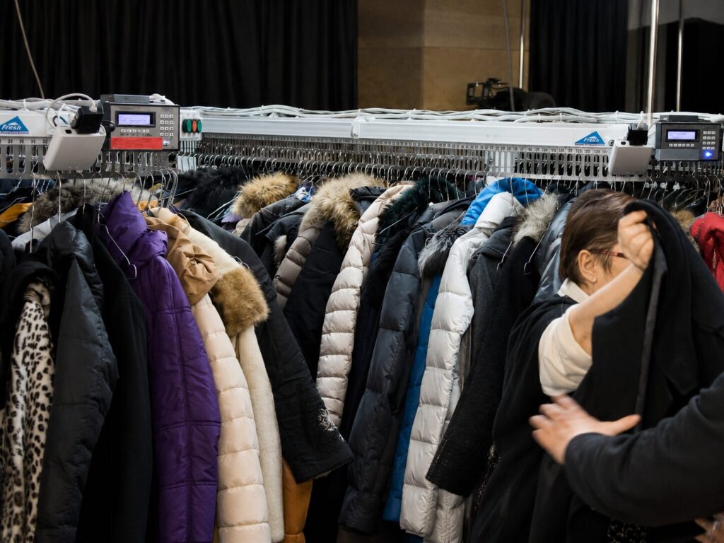 Busy coat check with automated rack system