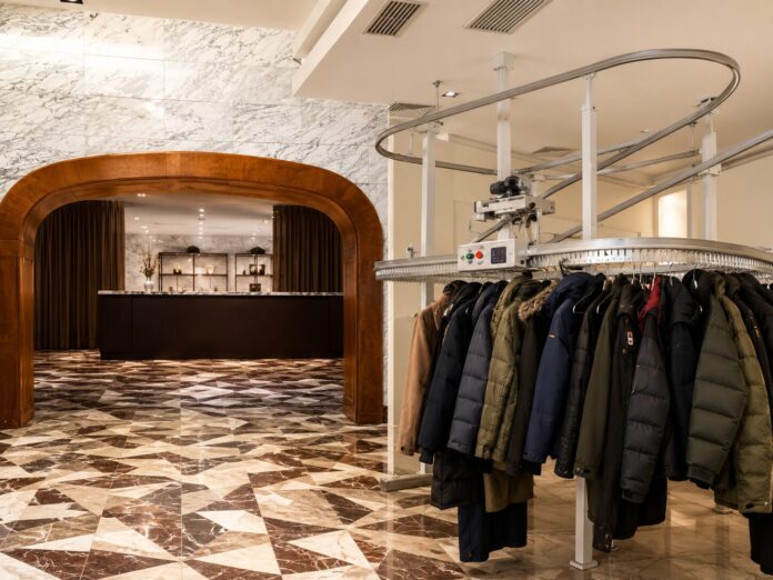 Elegant hotel lobby with coat carousel How to Organize a Coat Check