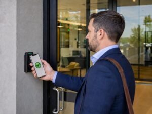 Employee using a smartphone for mobile door access